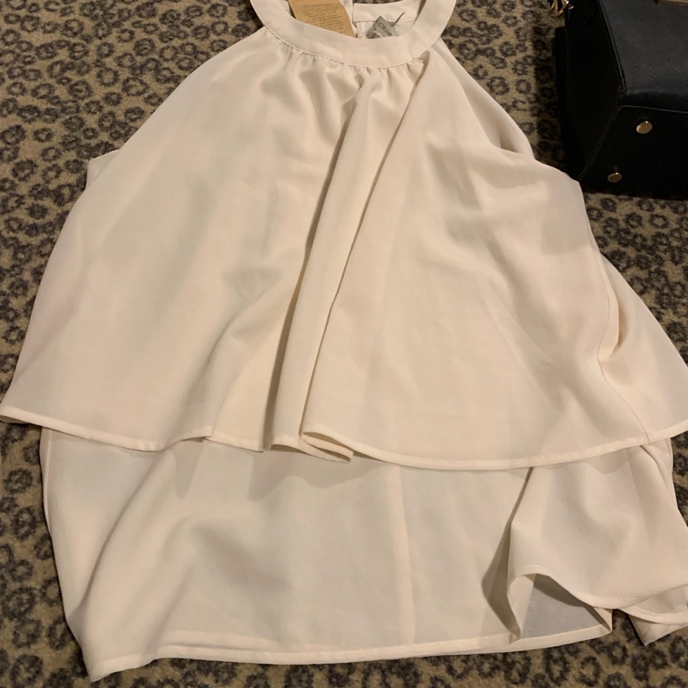 Cream sleeveless blouse!